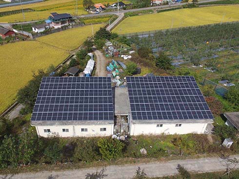 Cas de système de rayonnage solaire à toit plat de Corée du Sud 68kw